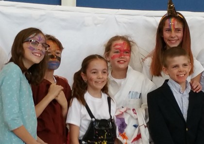 Ruth in the middle, red makeup
