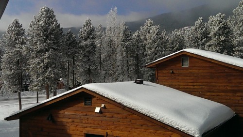 An early March Snow. Looking over our roof toward Black Mountain